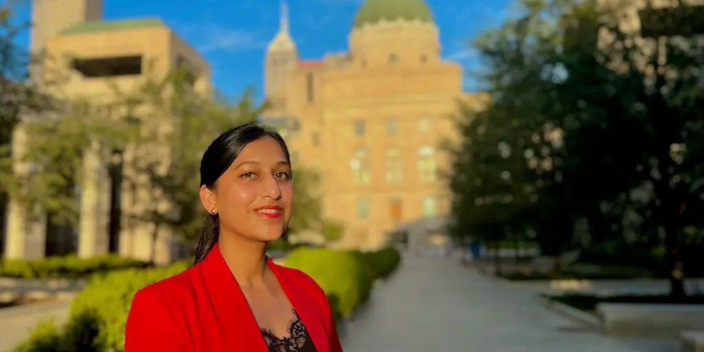 Palak Rajauria in front of the Indiana State House